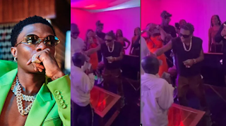 Checkout the moment Wizkid makes Dollars rain on an upcoming rapper after showing his rapping prowess (Video)